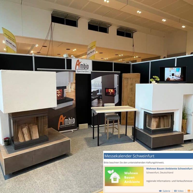 Messestand mit zwei modernen AMBIO Speicheröfen auf der Messe Wohnen Bauen Ambiente in Schweinfurt 2026